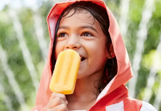 Child eating an ice lolly