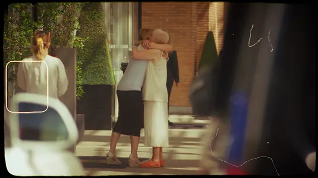People hugging near The Shard in London