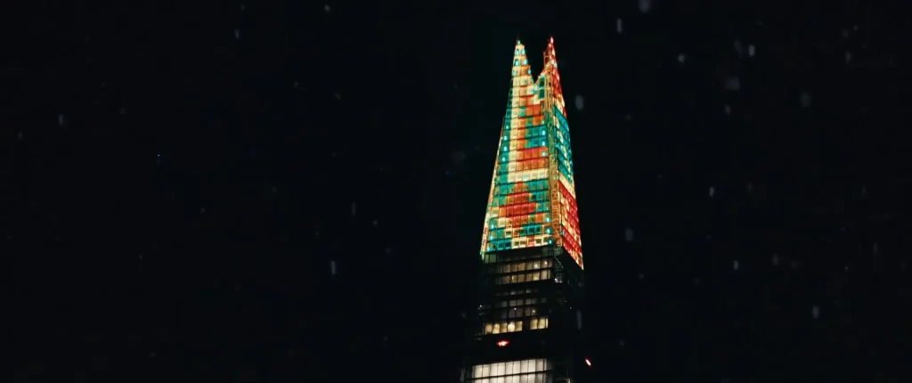Christmas illuminations in The Shard in London, shot against the night sky