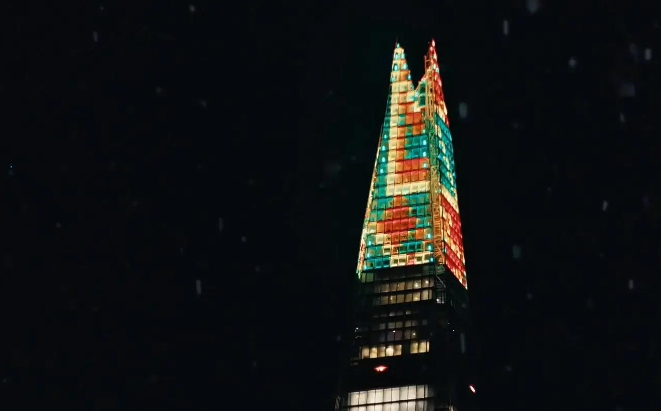 Christmas illuminations in The Shard in London, shot against the night sky