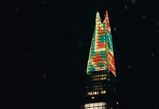 Christmas illuminations in The Shard in London, shot against the night sky