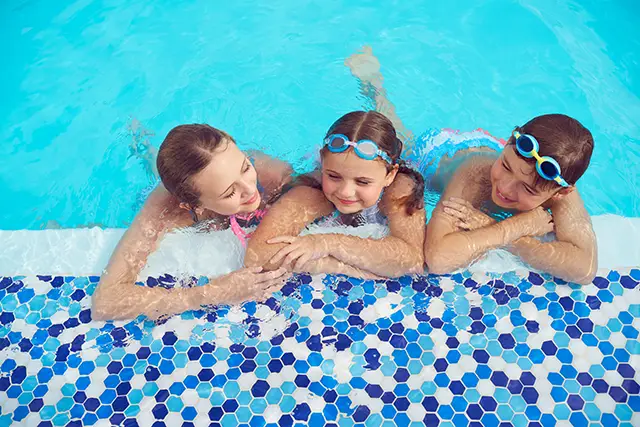 A family in a swimming pool on a P&O Cruises holiday