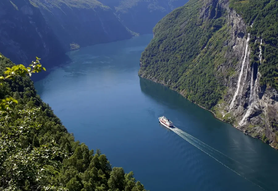 P&O Cruises' ship sailing up a fjord