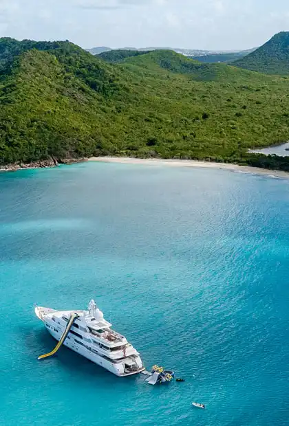 A superyacht moored in a bay